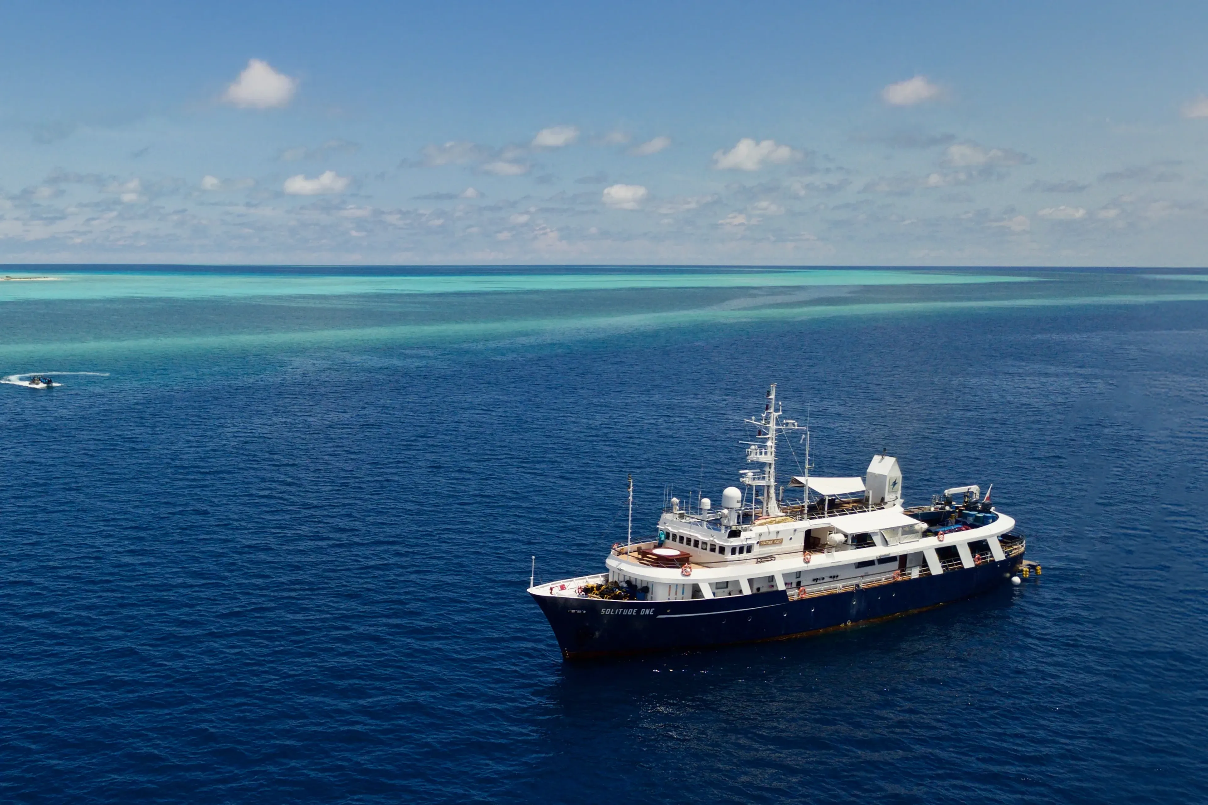 24_solitude-world_tubbataha_members_cruising.webp